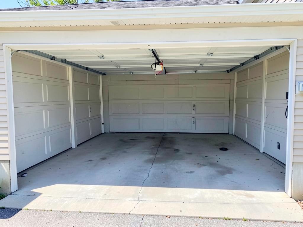 Empty swept residential garage after a full cleanout
